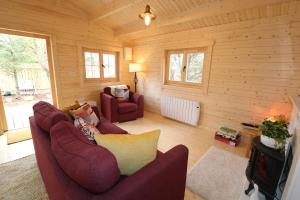 Posezení v ubytování Inisean Lodge log cabin -part of Inisean B&B