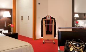 A bed or beds in a room at Park Hotel Centro Congressi