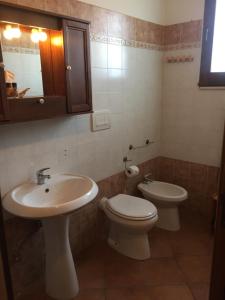 Koupelna v ubytování Agriturismo Arangèa + 34 fotografií
