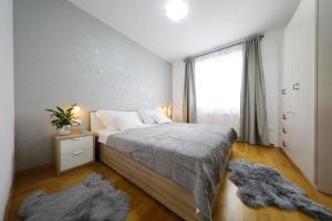 Postel nebo postele na pokoji v ubytování Villa Immortelle with pool and sea view + 37 fotografií