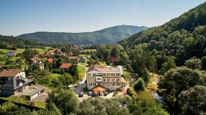 an aerial view of a village in the mountains at Ośrodek Nad Wodospadem in Międzybrodzie Bialskie