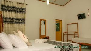 Säng eller sängar i ett rum på Mount View Holiday Resort