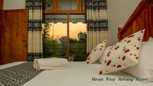 Posteľ alebo postele v izbe v ubytovaní Mount View Holiday Resort