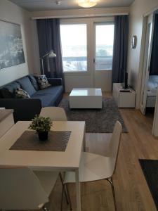 Posezení v ubytování Kotimaailma Apartments Rovaniemi