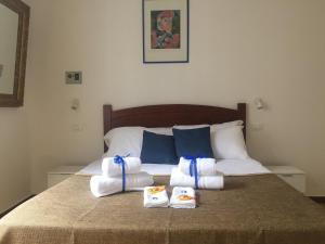 A bed or beds in a room at YooRoom