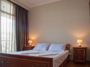 Cozy Guest House in Old Batumi客房内的一张或多张床位