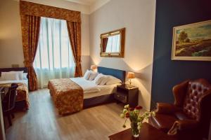 Rúm í herbergi á Hotel Julian
