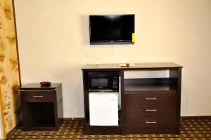 Kuchyň nebo kuchyňský kout v ubytování Andrews Motor Inn