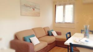 Area soggiorno di Apartment Conchiglie