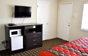 Kuchyň nebo kuchyňský kout v ubytování Andrews Motor Inn
