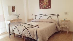 Letto o letti in una camera di Apartment Conchiglie