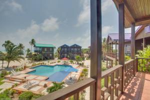 an aerial view of the pool at the resort at X'tan Ha- The Waterfront in San Pedro