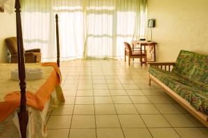 Χώρος καθιστικού στο Sunrise Apartments Hotel Fort Portal