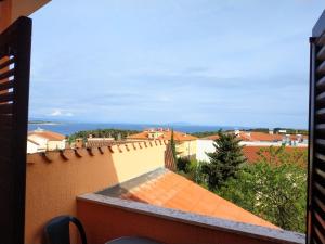 - une vue depuis le balcon d'un bâtiment dans l'établissement Vila Sanja, à Premantura