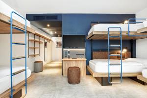 H2 Hotel München Olympiapark客房内的一张或多张床位