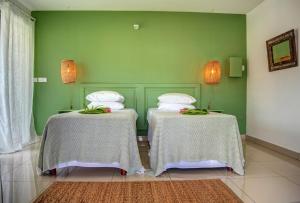 Katil atau katil-katil dalam bilik di Hotel Pelican