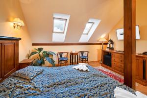 Ein Bett oder Betten in einem Zimmer der Unterkunft Salvator Hotel