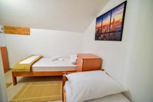 Postel nebo postele na pokoji v ubytování Hostel Sinj