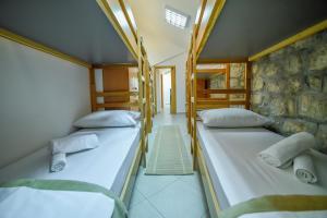 Postel nebo postele na pokoji v ubytování Hostel Sinj
