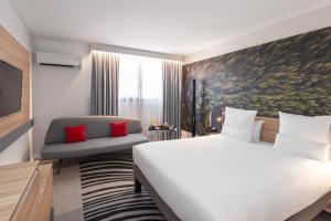 Cama ou camas em um quarto em Novotel Blois Centre Val De Loire