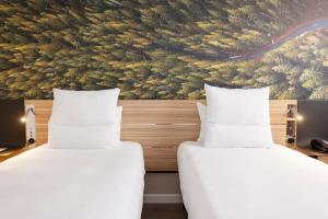 Cama ou camas em um quarto em Novotel Blois Centre Val De Loire