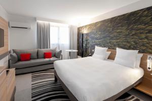 Cama ou camas em um quarto em Novotel Blois Centre Val De Loire