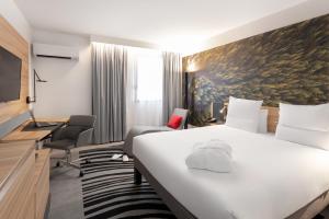 Cama ou camas em um quarto em Novotel Blois Centre Val De Loire