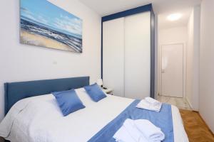 Rúm í herbergi á Luxury Apartment ELA