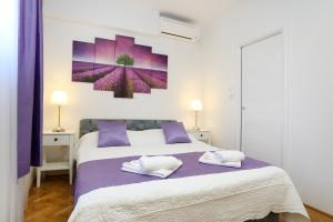 Rúm í herbergi á Luxury Apartment ELA
