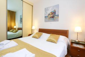 Postel nebo postele na pokoji v ubytování Luxury Apartment ELA