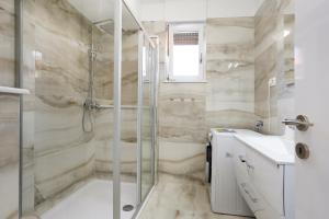 Baðherbergi á Luxury Apartment ELA