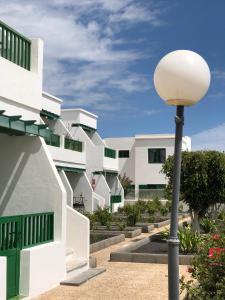 a street light in front of a building at Casa Luna in Puerto del Carmen