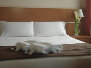 Кровать или кровати в номере Hotel Avión by Bossh! Hotels