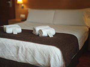 Кровать или кровати в номере Hotel Avión by Bossh! Hotels