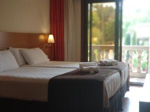 Кровать или кровати в номере Hotel Avión by Bossh! Hotels