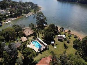 an aerial view of a resort with a pool and a beach at Marina e Pousada Porto do Sol in Nazaré Paulista +36 photos