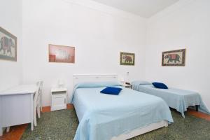 Łóżko lub łóżka w pokoju w obiekcie Villa Panoramica - Ischia Ponte