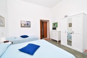 Łóżko lub łóżka w pokoju w obiekcie Villa Panoramica - Ischia Ponte