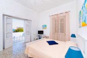 Łóżko lub łóżka w pokoju w obiekcie Villa Panoramica - Ischia Ponte