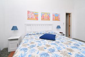 Łóżko lub łóżka w pokoju w obiekcie Villa Panoramica - Ischia Ponte