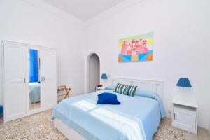 Łóżko lub łóżka w pokoju w obiekcie Villa Panoramica - Ischia Ponte