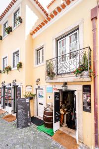 a store front of a building with a window at Castle Inn Lisbon Apartments in Lisbon