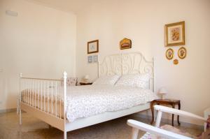 Postel nebo postele na pokoji v ubytování Casa Gentile Carducci