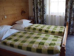 Postel nebo postele na pokoji v ubytování Haus Postfeld
