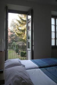Postel nebo postele na pokoji v ubytování B&B Entro Le Mura