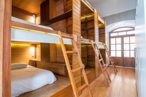 Letto o letti in una camera di Viajero Quito Hostel
