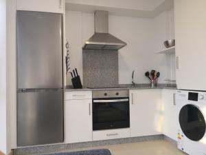 Kuchyňa alebo kuchynka v ubytovaní Apartamento en Ribeira(centro) 1*planta