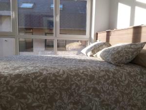 Posteľ alebo postele v izbe v ubytovaní Apartamento en Ribeira(centro) 1*planta