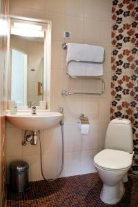 Kylpyhuone majoituspaikassa Arno Apartments