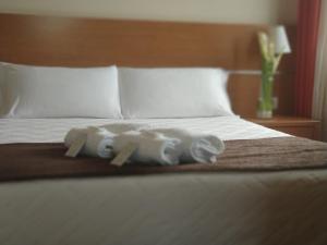 Кровать или кровати в номере Hotel Avión by Bossh! Hotels